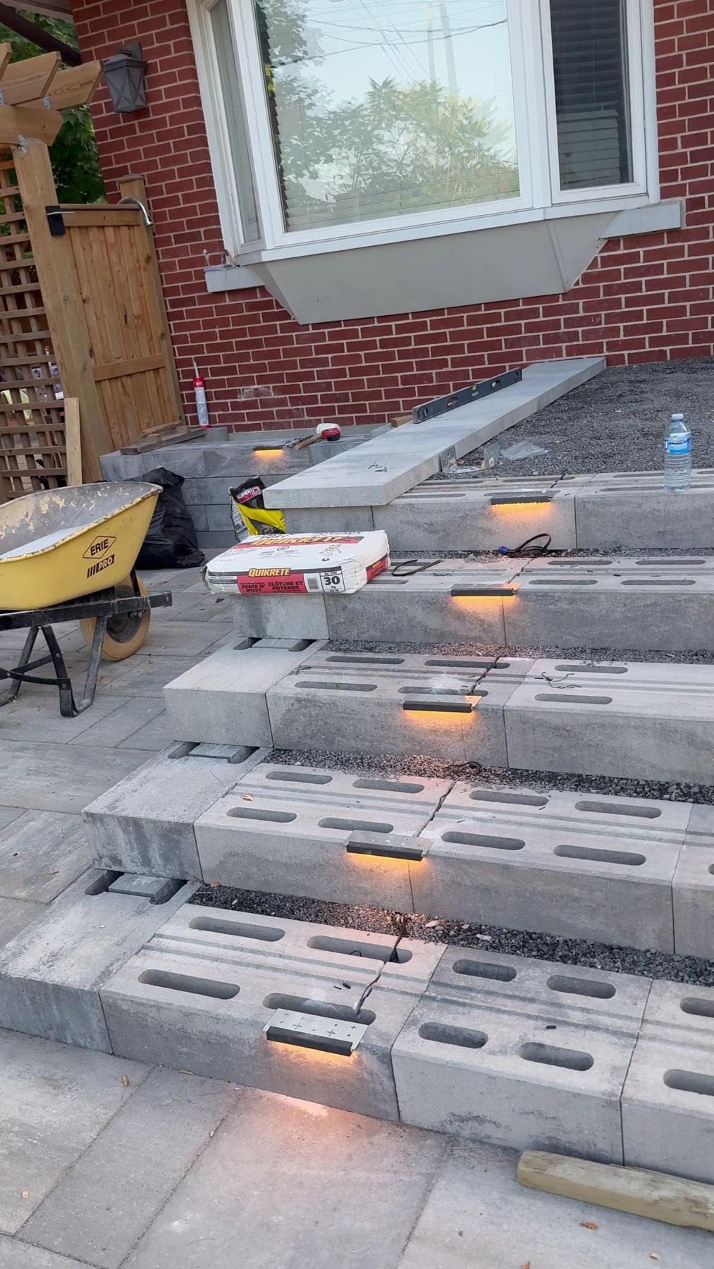 Outdoor stone steps with lights set into each riser